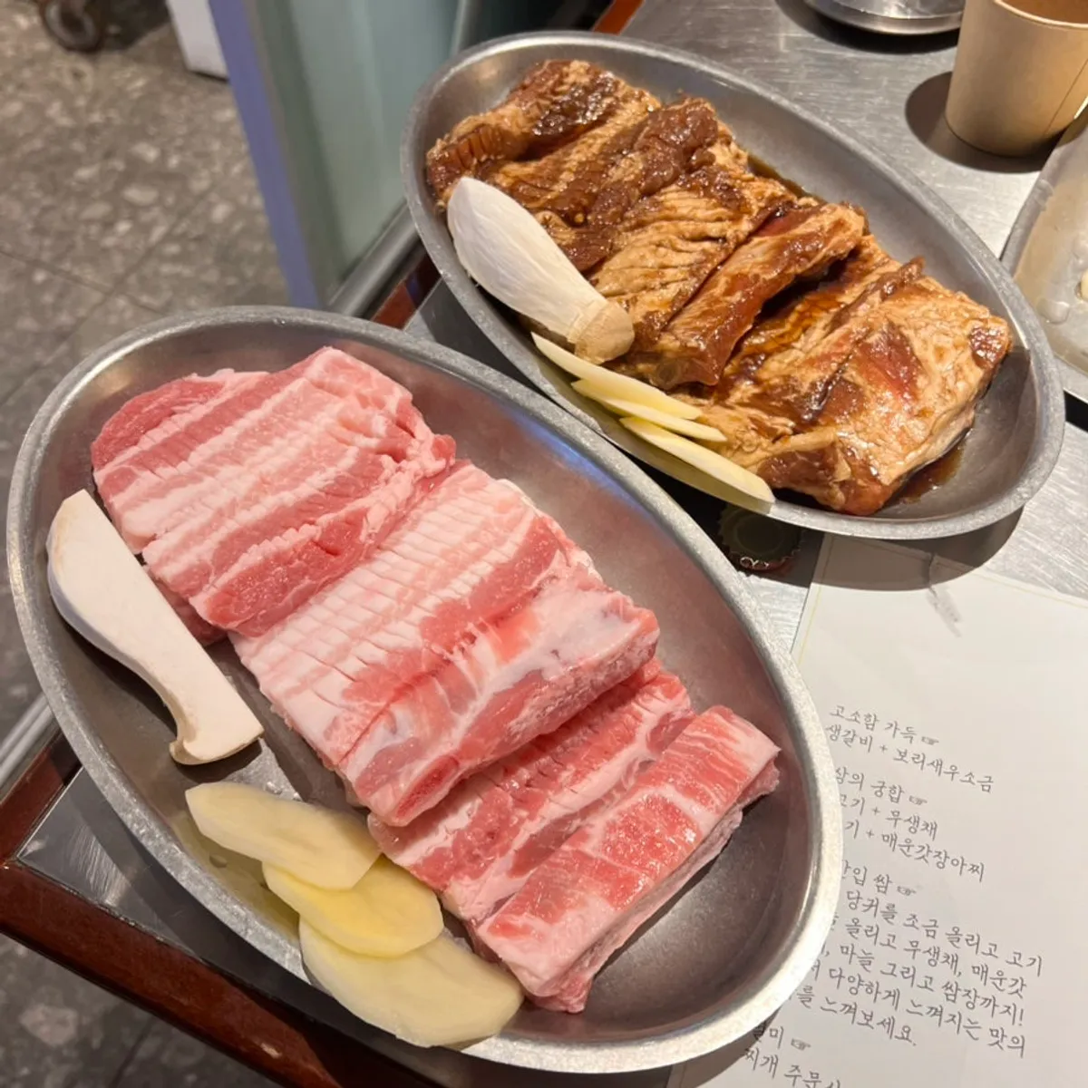 Plate of plain and marinated pork ribs