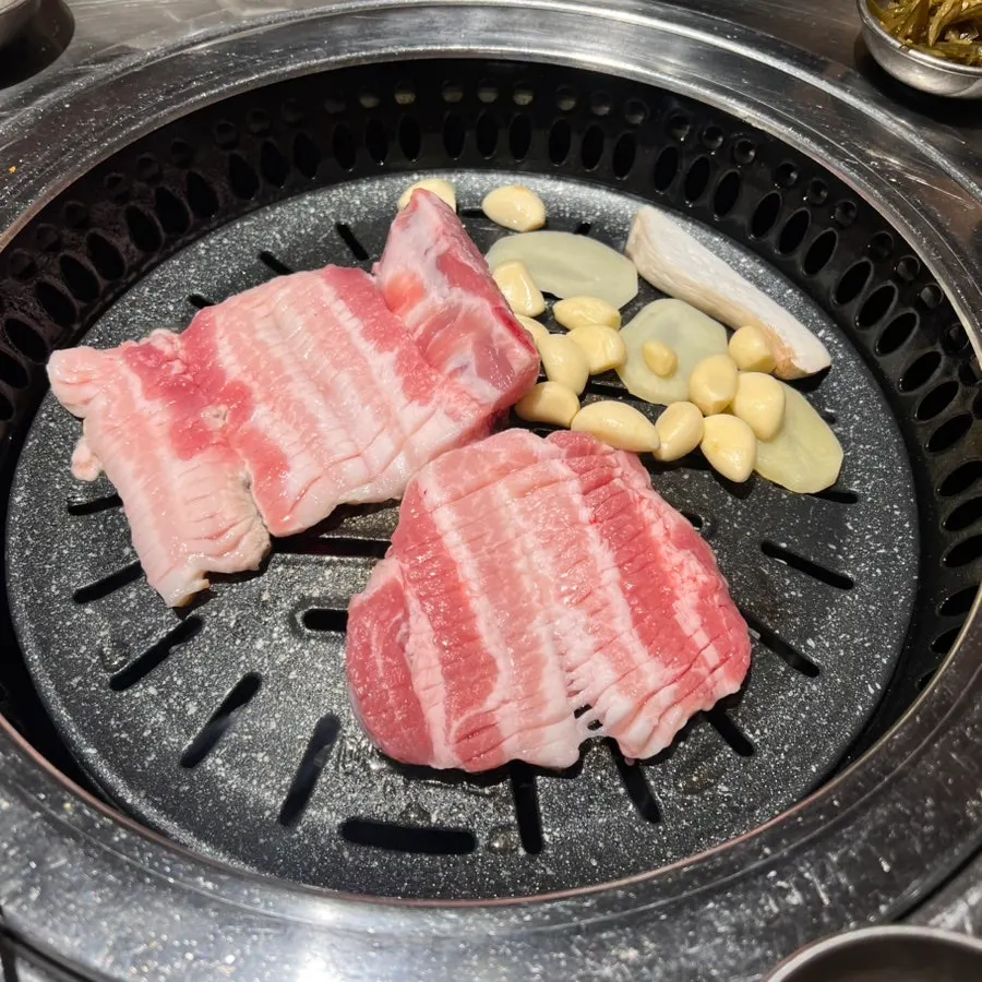 Plain ribs placed on the charcoal grill