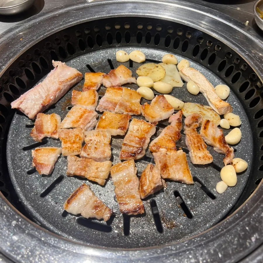 Sliced plain ribs grilling to a golden brown
