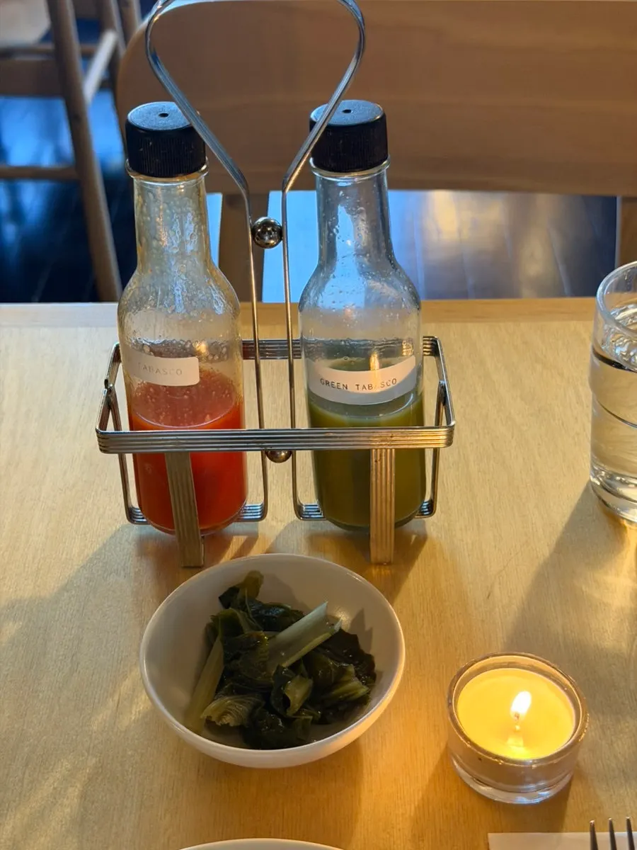 A mini candle on the table after dark