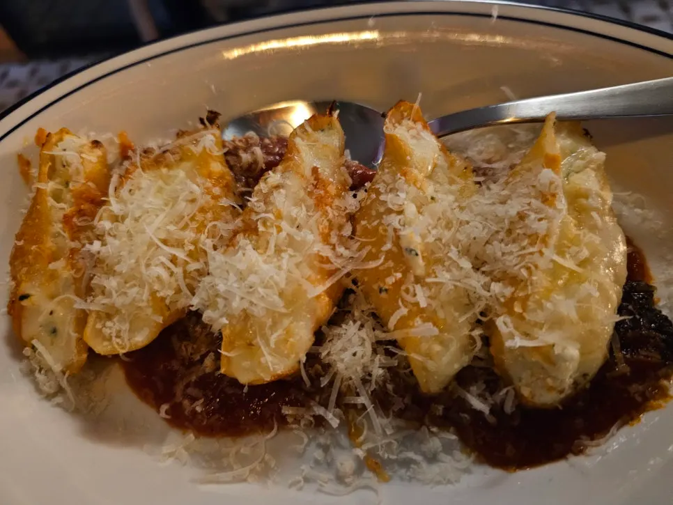 Cream Pillow Chicken Pasta served with a drink