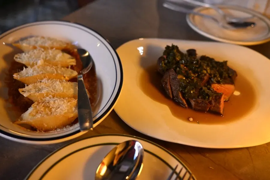 Pasta and steak set on the table