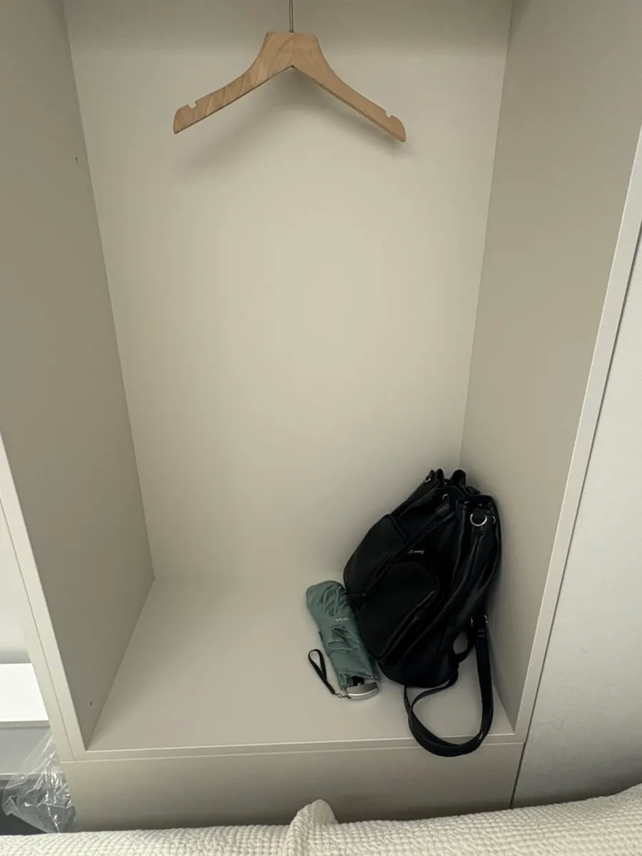 Storage space next to the bed