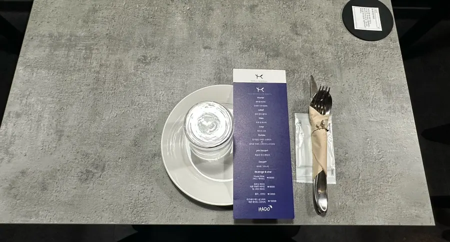 Tableware set up at a table in Hado