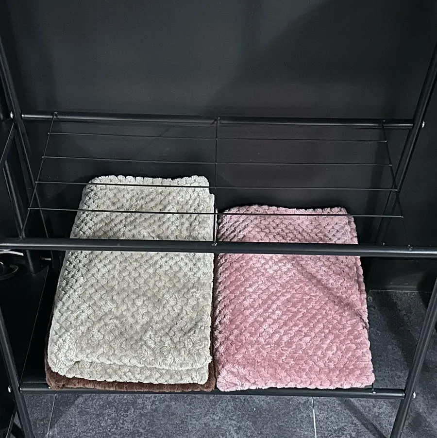Corner with coat hanger and blankets provided