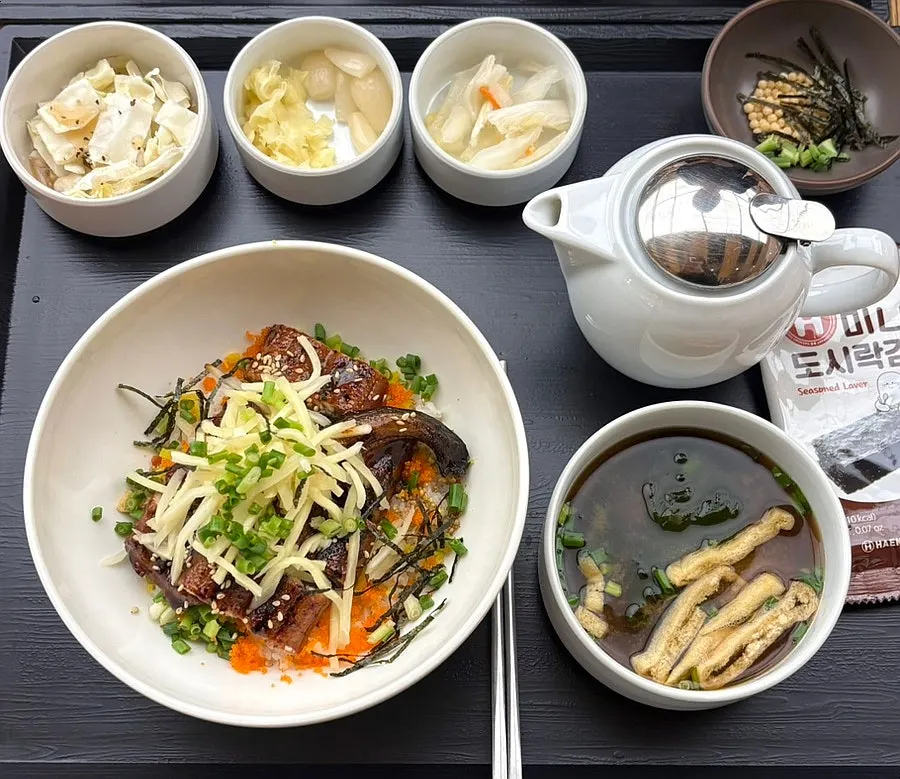 Eel rice bowl ochazuke topped with a whole freshwater eel