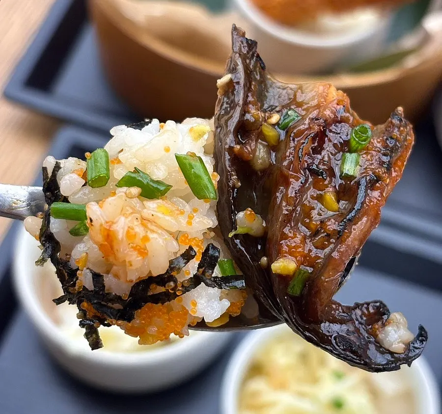 Eel piled on top of abalone porridge