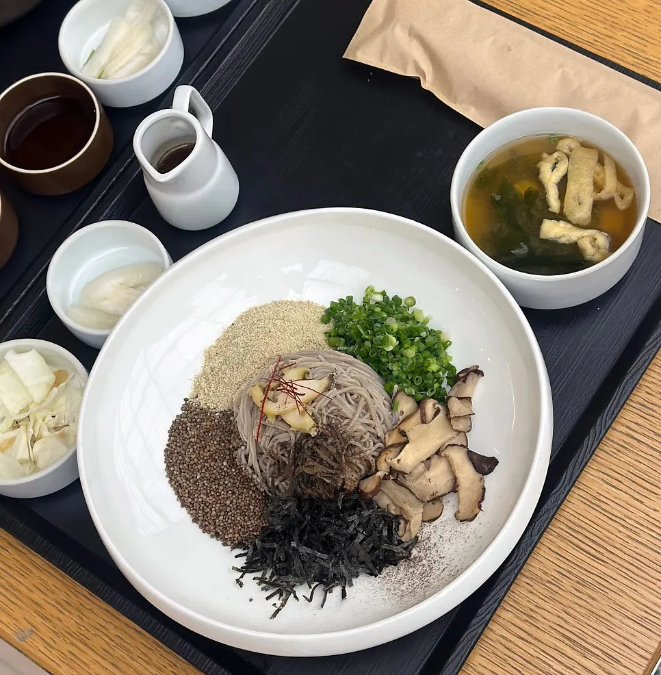 Abalone porridge topped with baek-kimchi