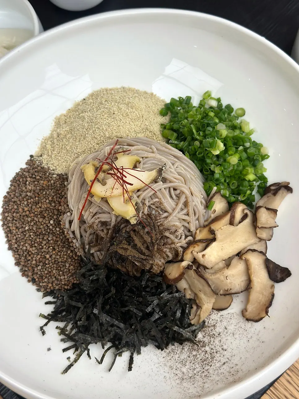 Single order of abalone perilla oil buckwheat noodles served with doenjang soup