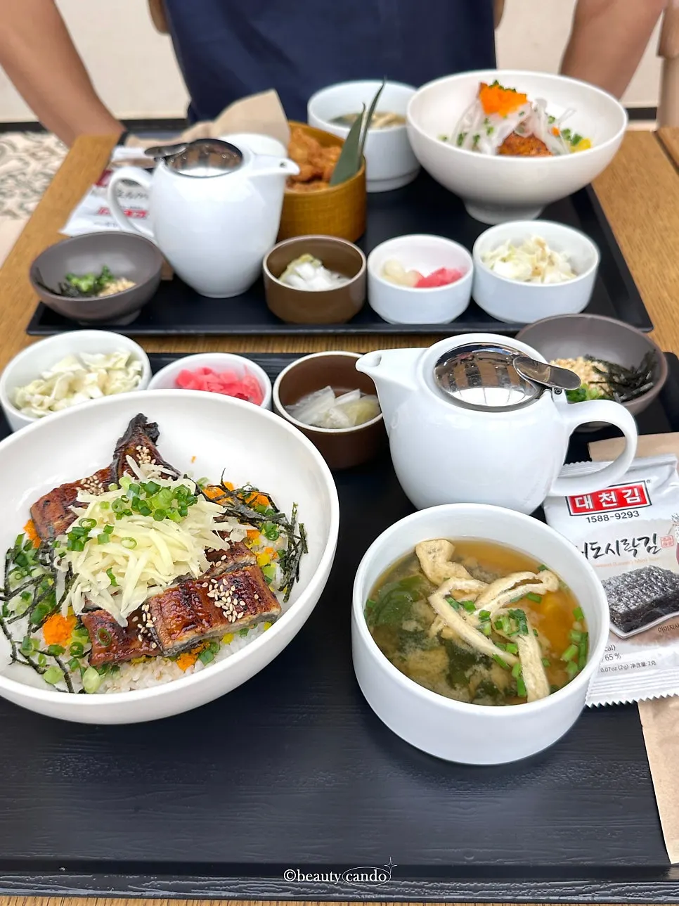 Neatly arranged full table setting of a Haehwagaban rice bowl meal