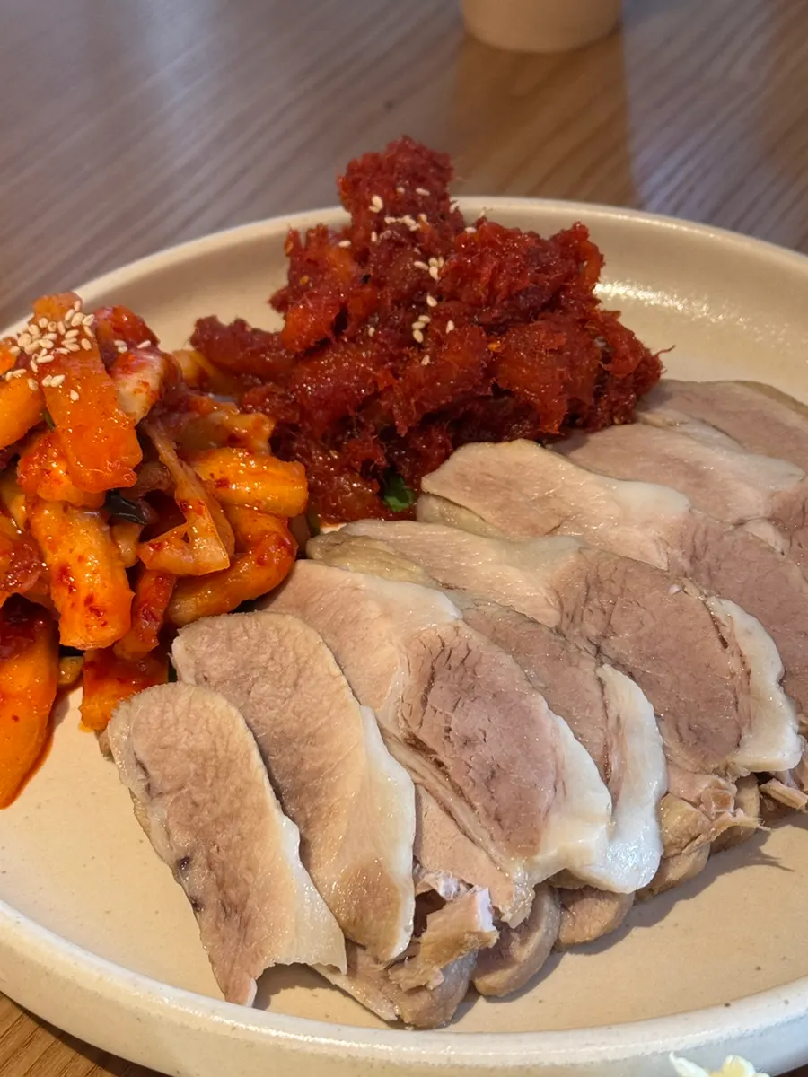A full spread of Haejeongjip's medium pollack sashimi bossam