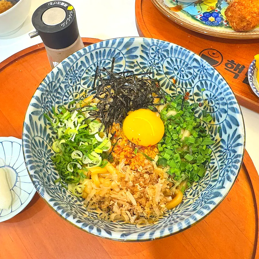 Mazesoba topped with egg yolk
