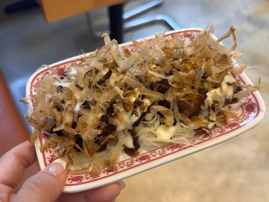 Mini okonomiyaki topped with bonito flakes