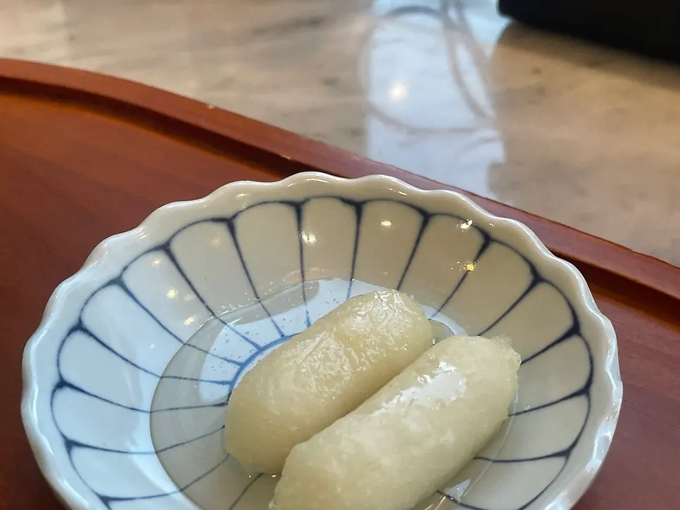 Honey-drizzled cheese-filled fried rice cake