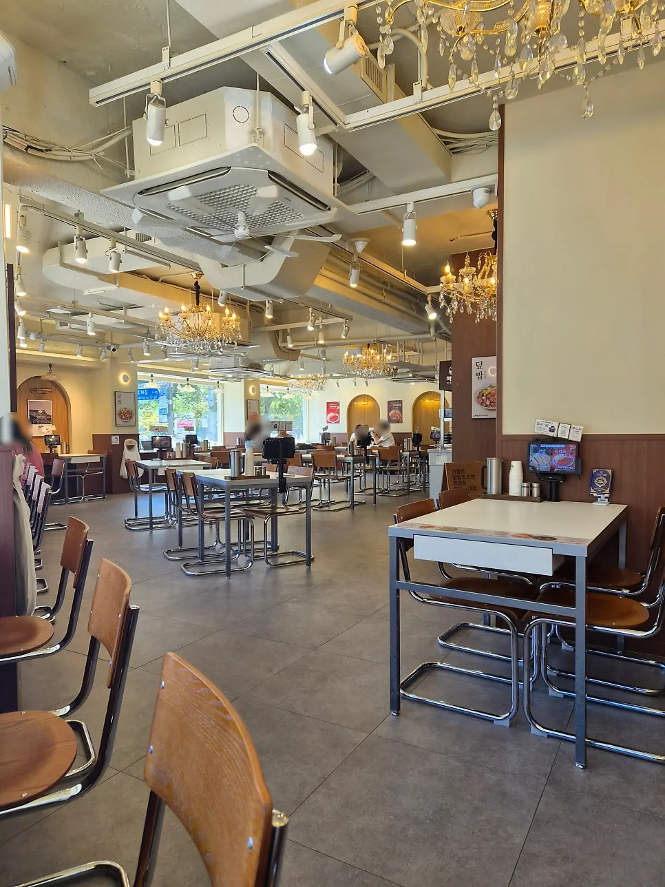 Early lunch restaurant with only one table of customers