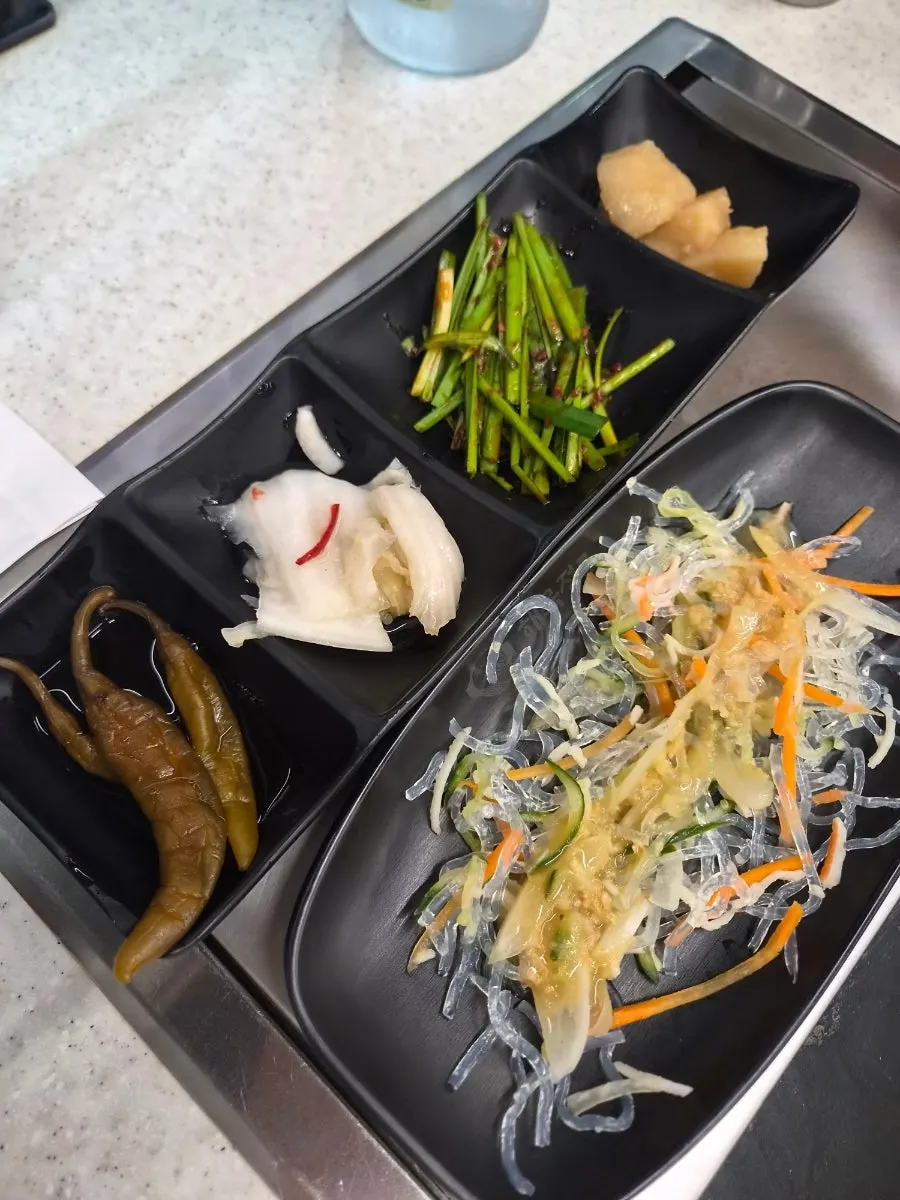 Complimentary squid-seaweed soup