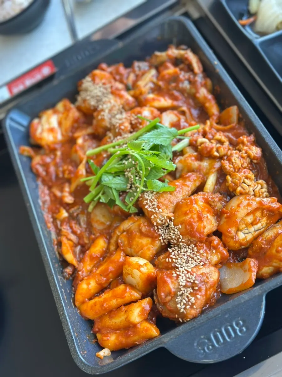 Close-up of the spicy sauce on the boneless angler fish