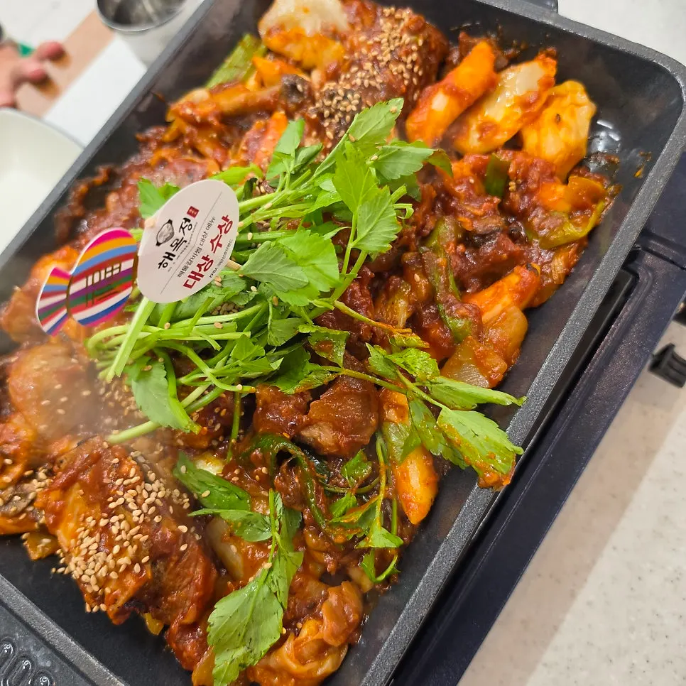 Spicy braised pork ribs hot plate mid-meal