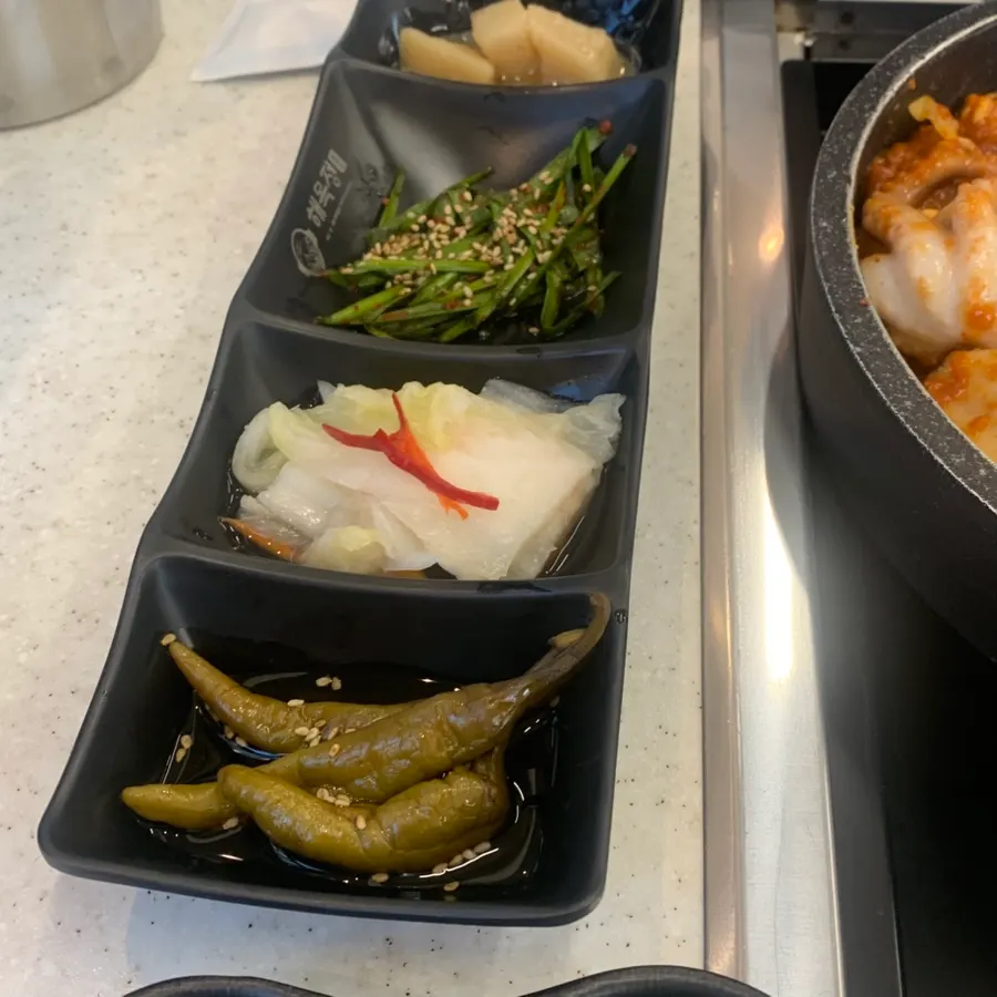 Fresh seafood piled on top of the braised ribs