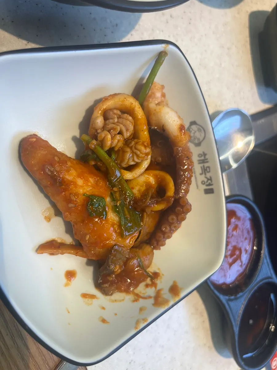 Ingredients from the seafood galbijjim lifted out
