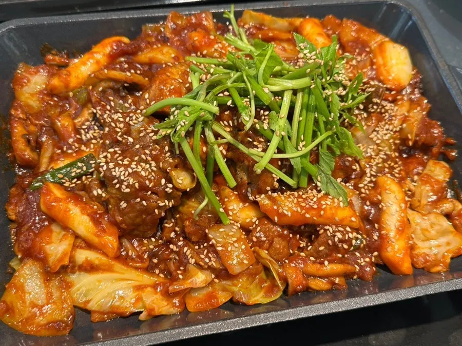 Table spread of spicy braised pork ribs at Haemokjeong Seoknam