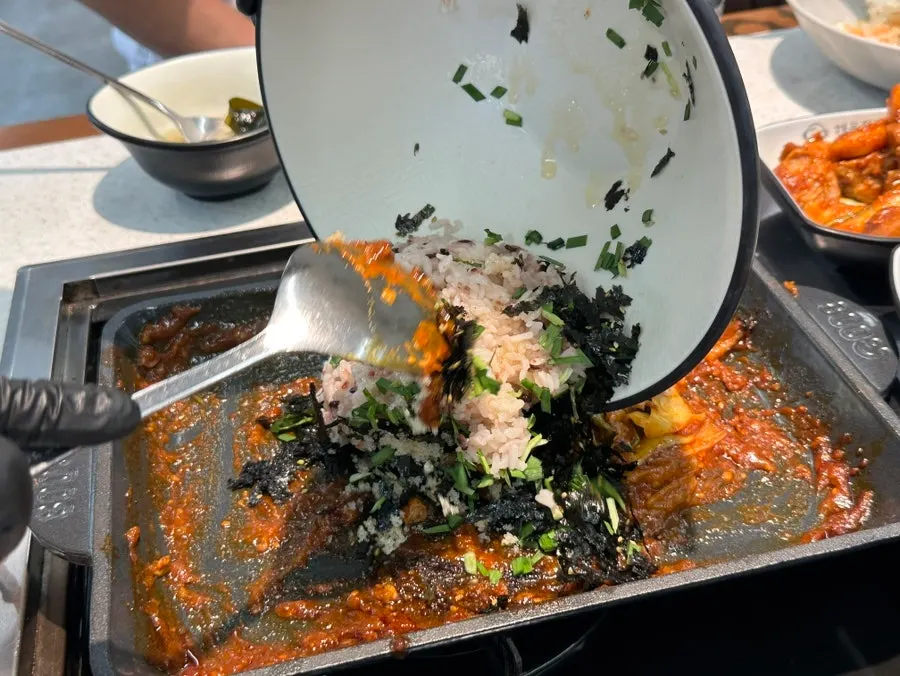 Self-serve fried rice cooked in the leftover sauce