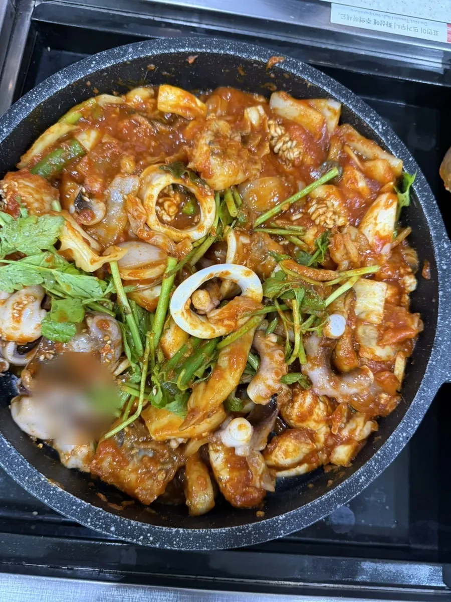 Seafood stew cut into easy-to-eat pieces