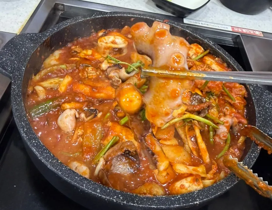 Close-up of tender, well-cooked whole octopus