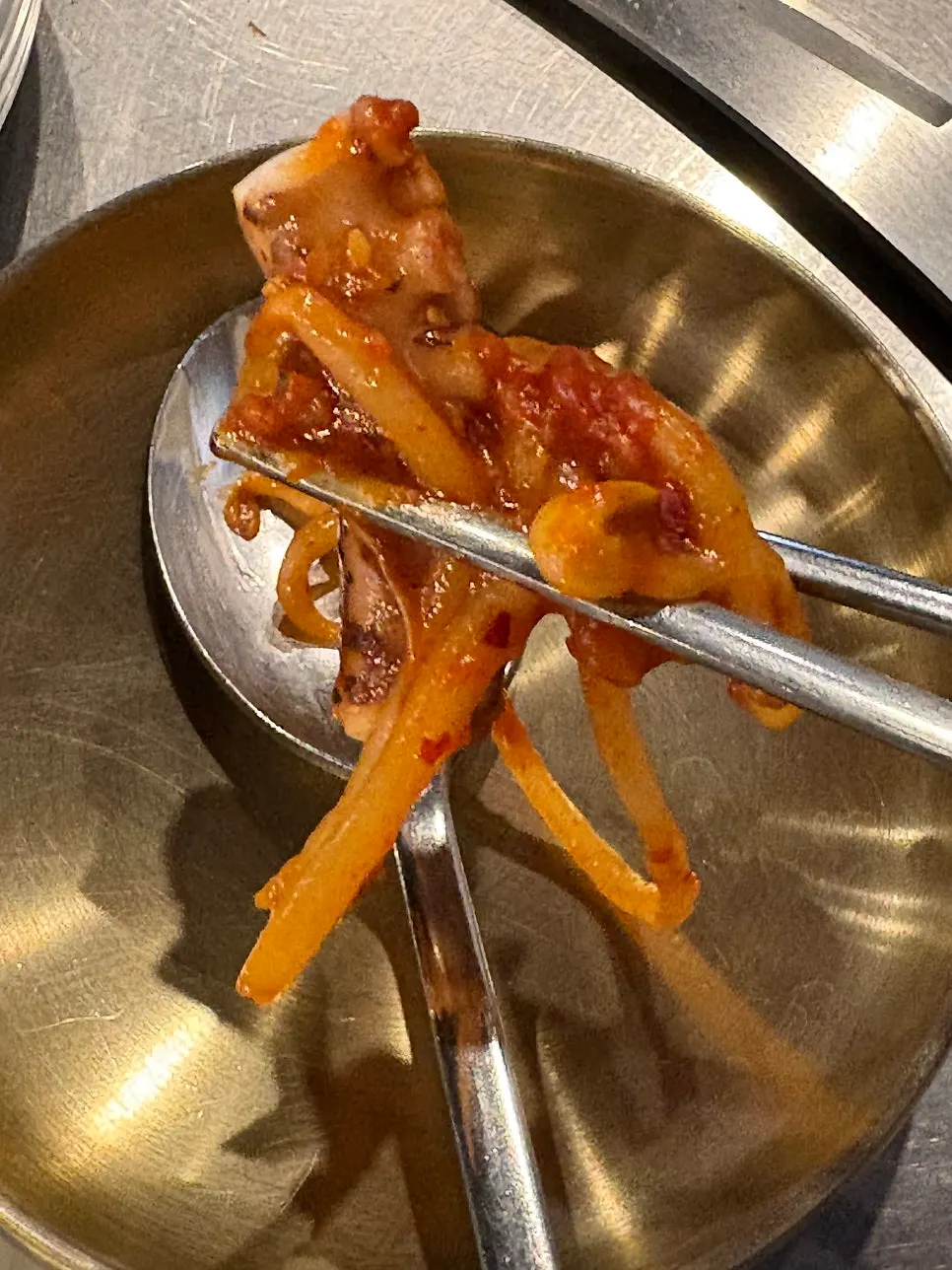 Spicy agujjim sauce and bean sprouts