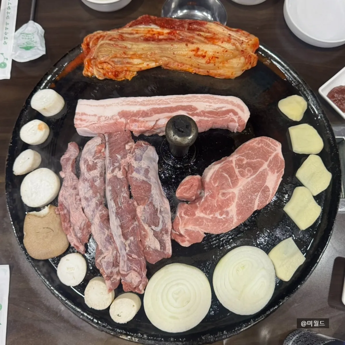 A hearty spread of meat and side dishes