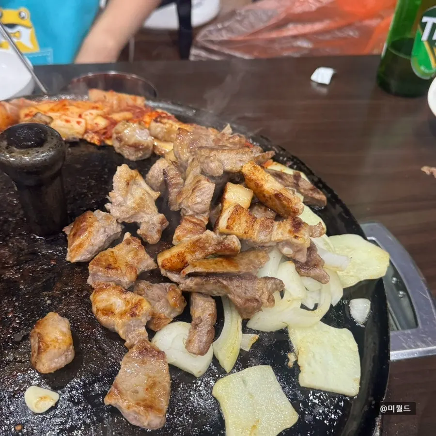 Meat and vegetables cooking to a golden brown