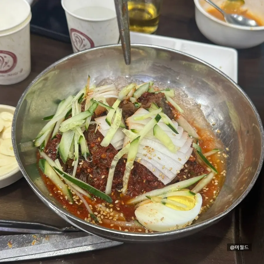 A bowl of mixed bibim-naengmyeon