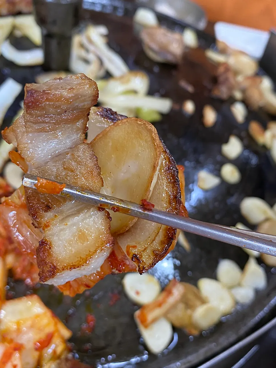 Grilled kimchi paired with pork belly