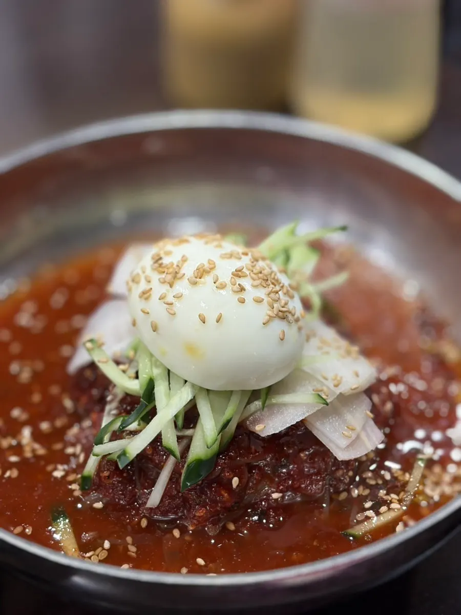Bowl of bibim naengmyeon ordered for dessert