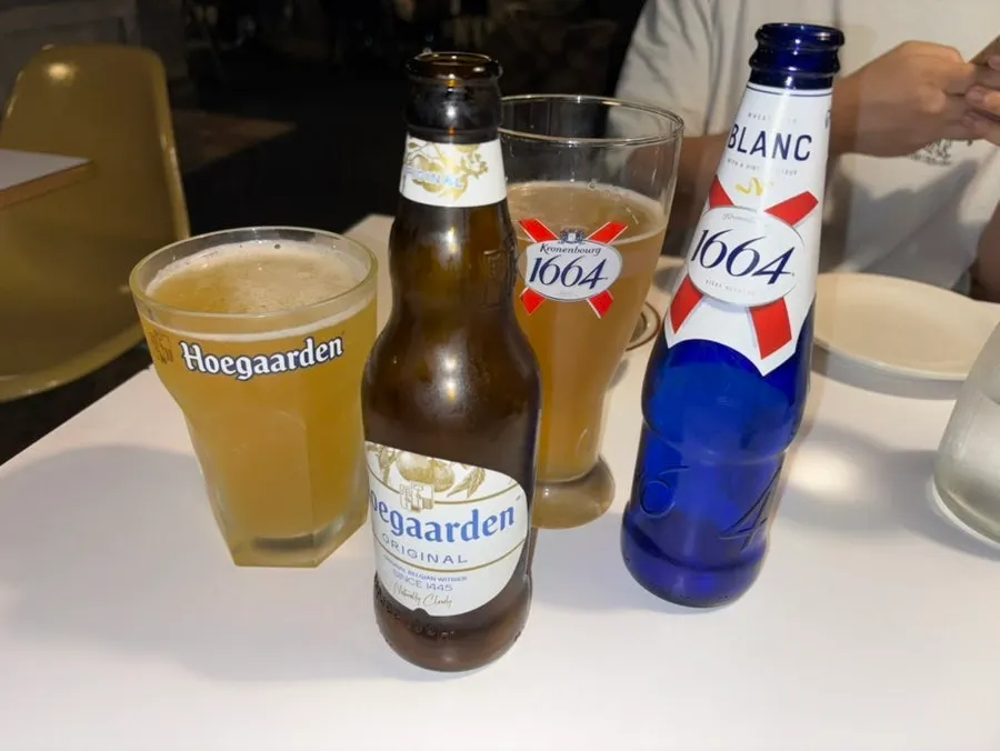 Hoegaarden and Blanc beers on the table