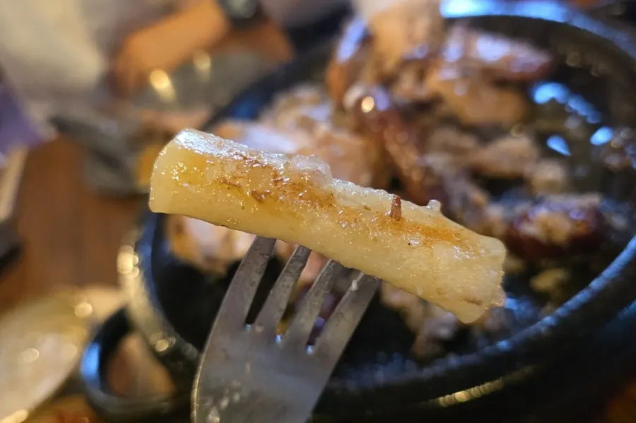 Rice cake side roasted golden-brown in chicken fat