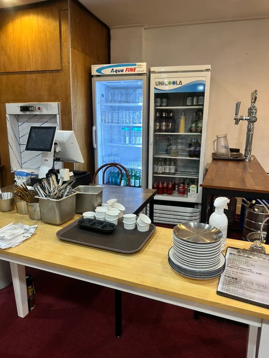 Water and small plate station by the counter