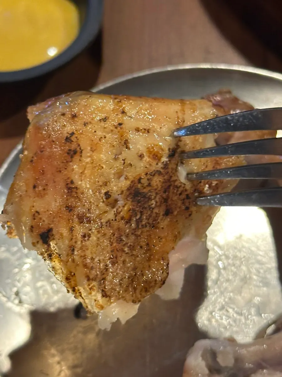 Oak-fired chicken cut into easy-to-eat pieces