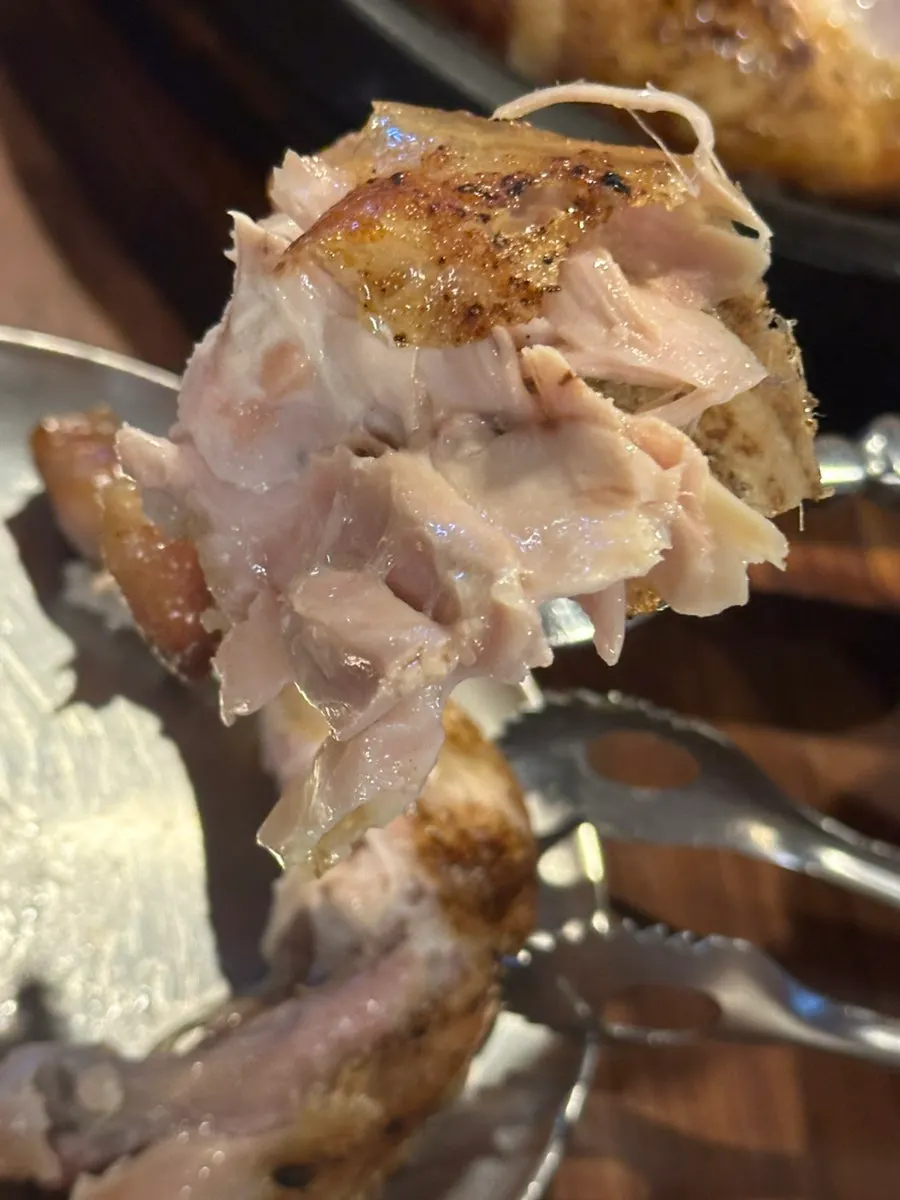 Close-up of a chicken leg from the hanbang jangjak-guiitongdak