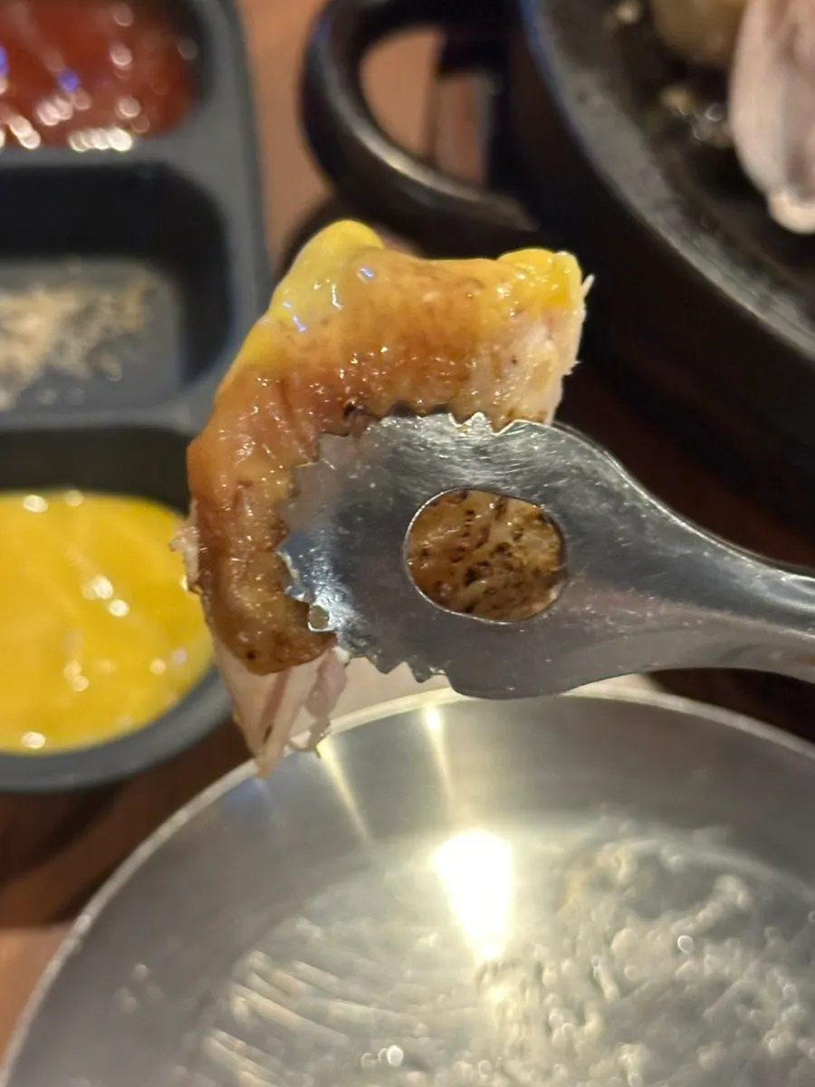 The roasted color of the oak-fired chicken skin