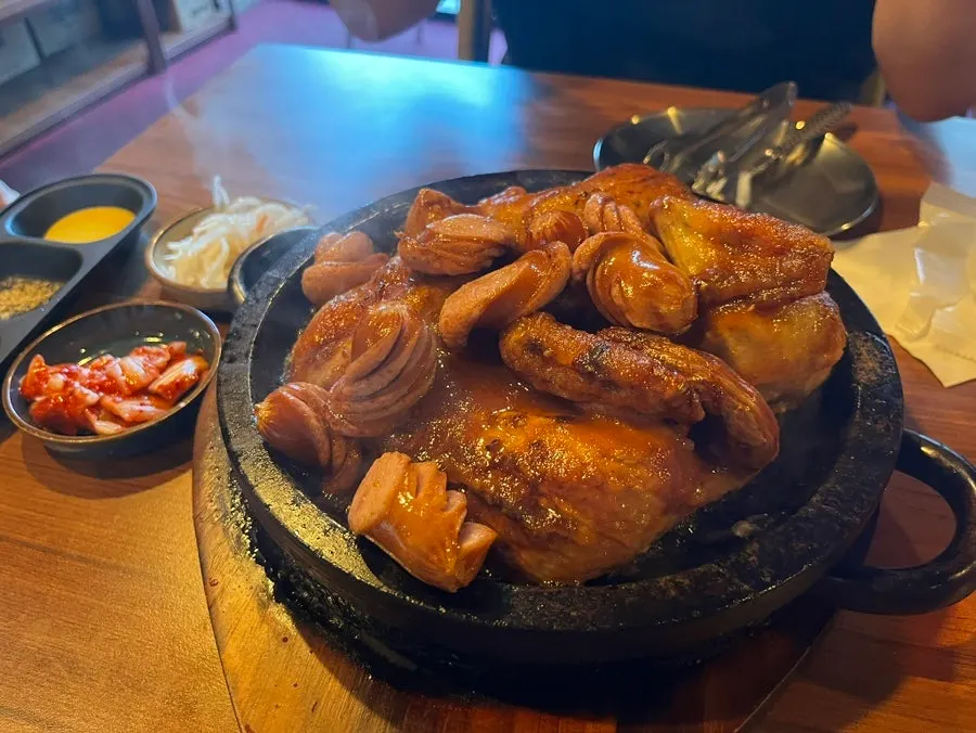 Oak-fired chicken set with added sausage