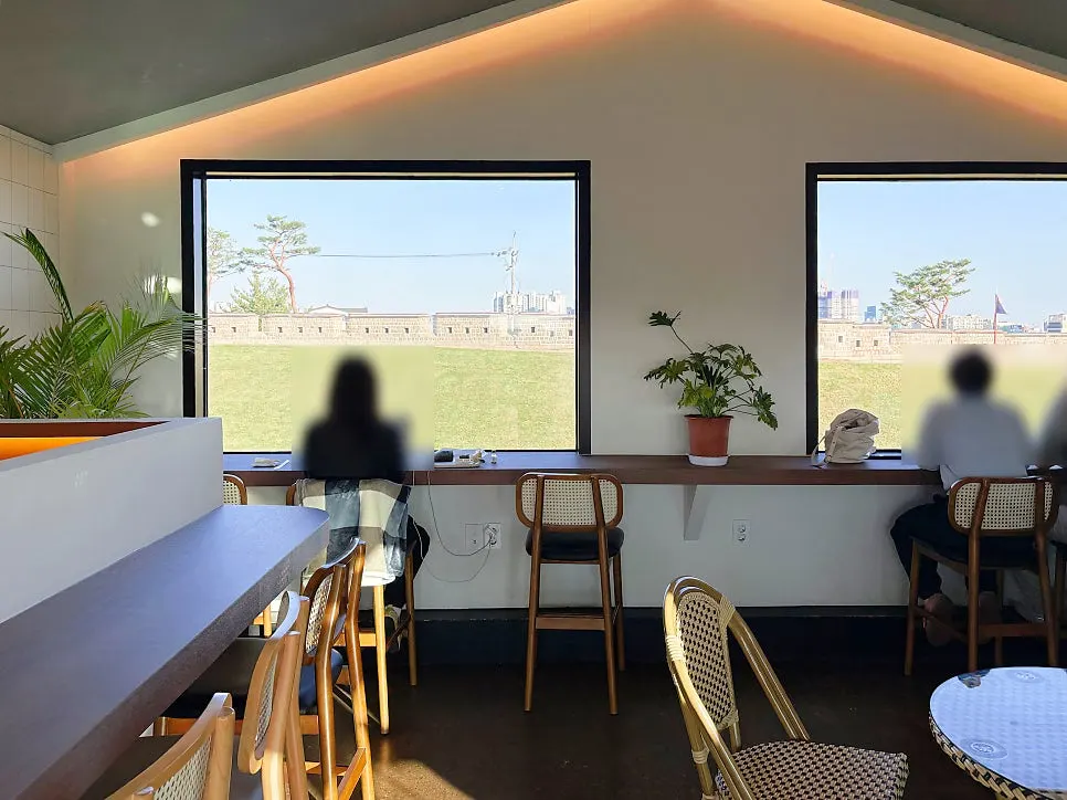 Hwaseong Fortress wall seen through the 2nd-floor window