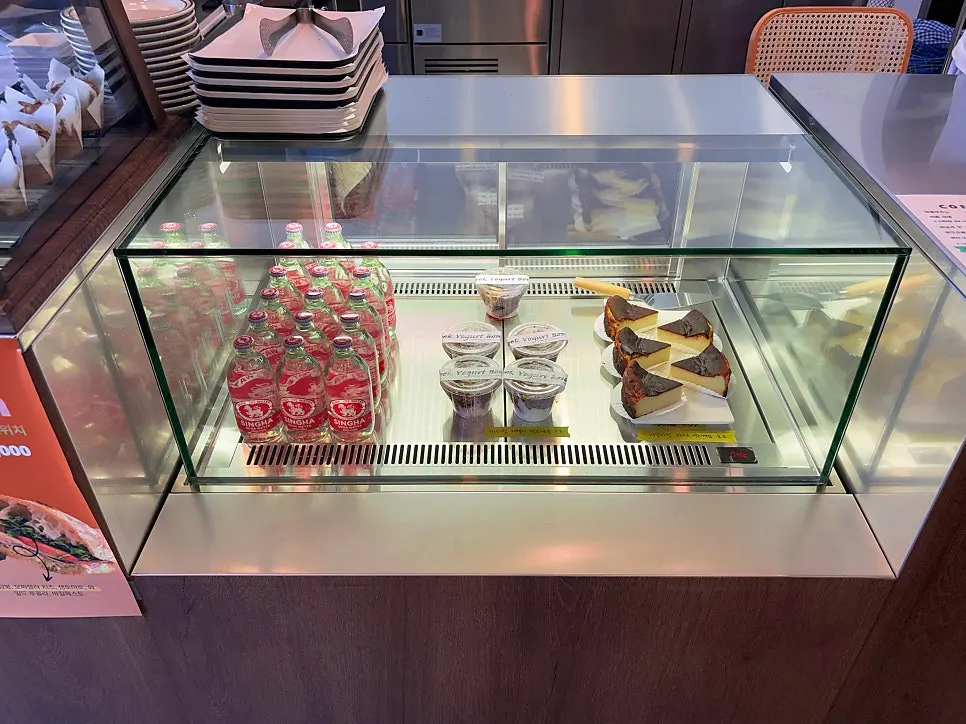 Dessert display with scones and cheesecake