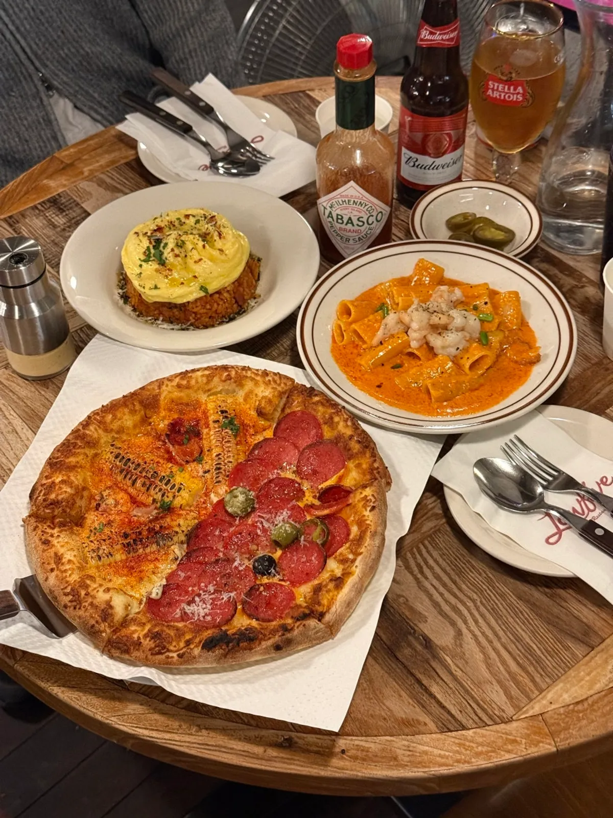 Half-and-half pizza and pasta spread at Low Five