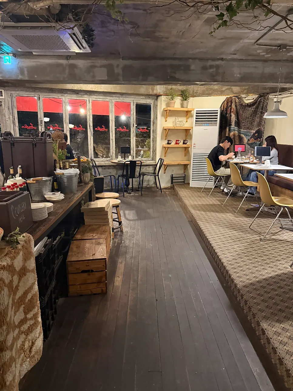 Hair ties and aprons ready at the self-serve corner