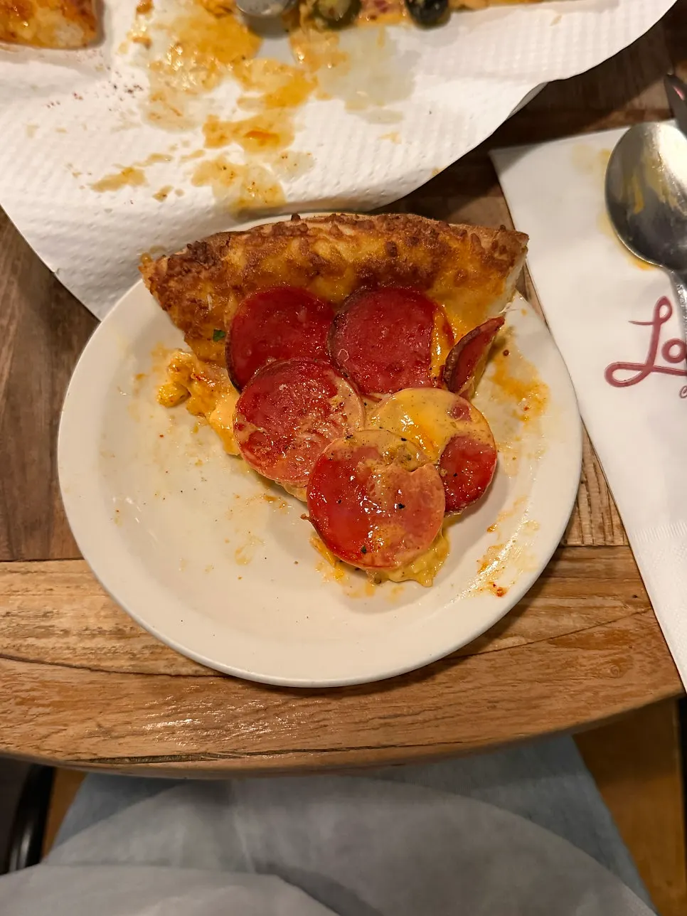 A slice piled high with pepperoni