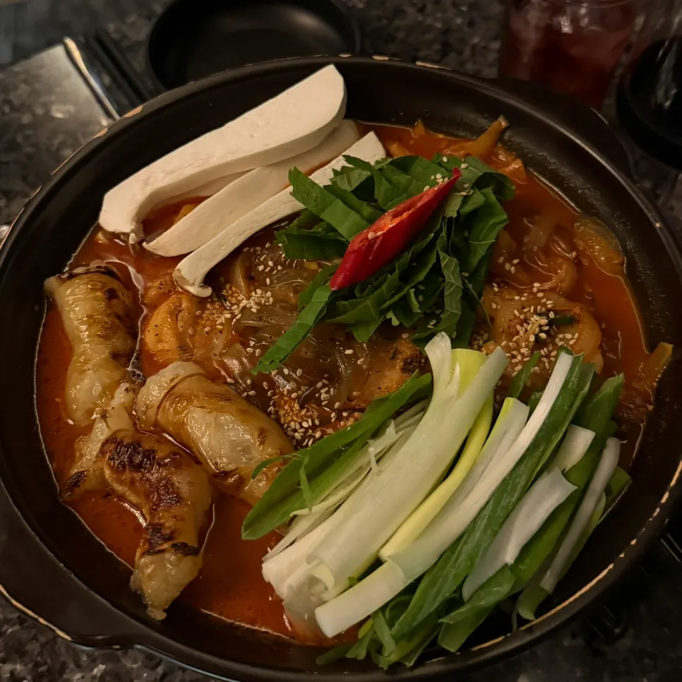 Korean beef daedoritang cooking at the table