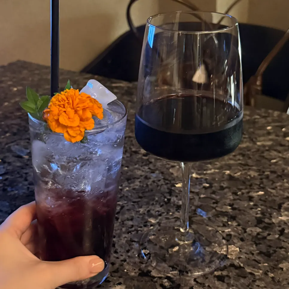 A bokbunja highball served alongside food