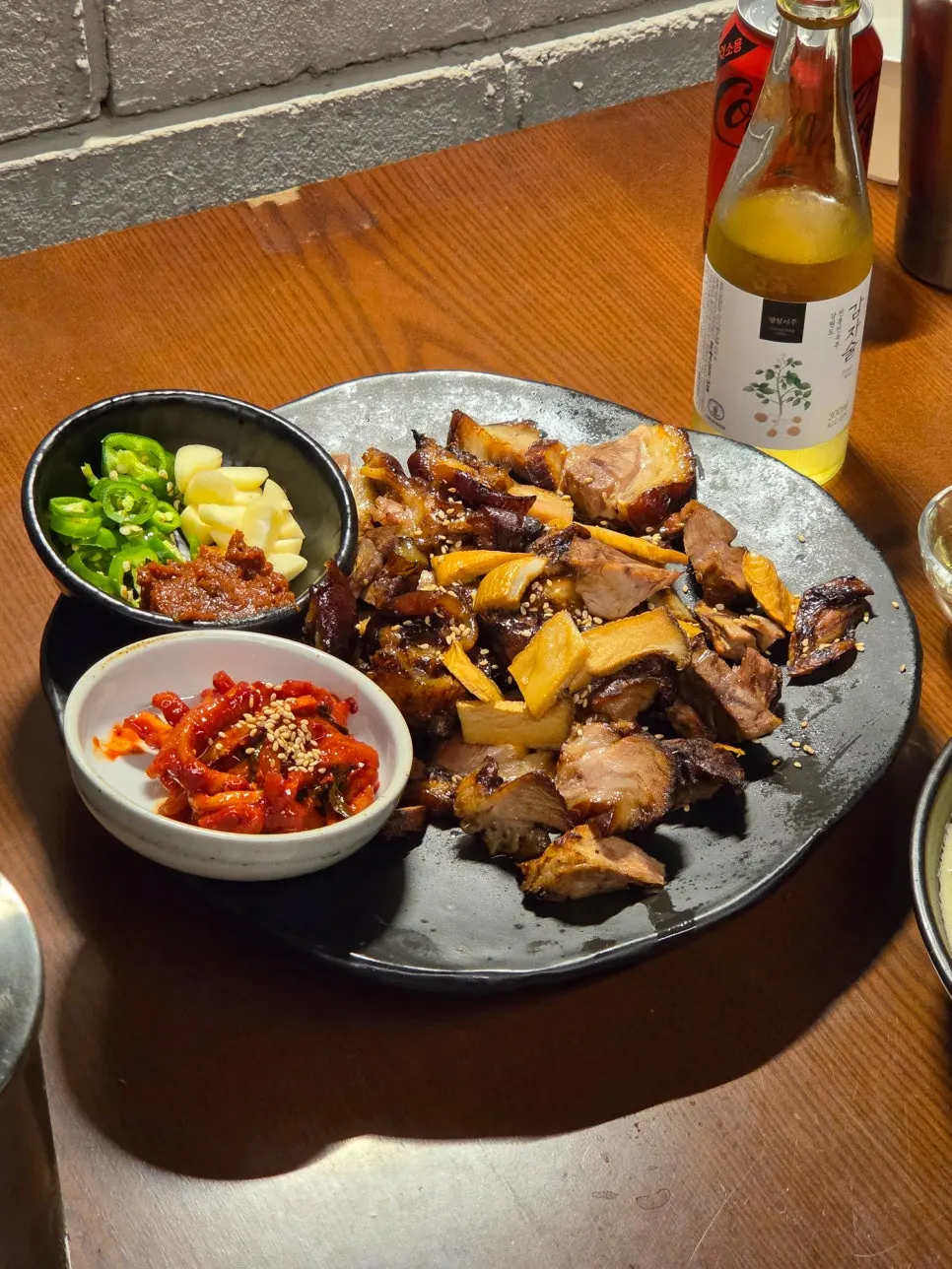 Table spread of grilled jokbal and gamtae pasta