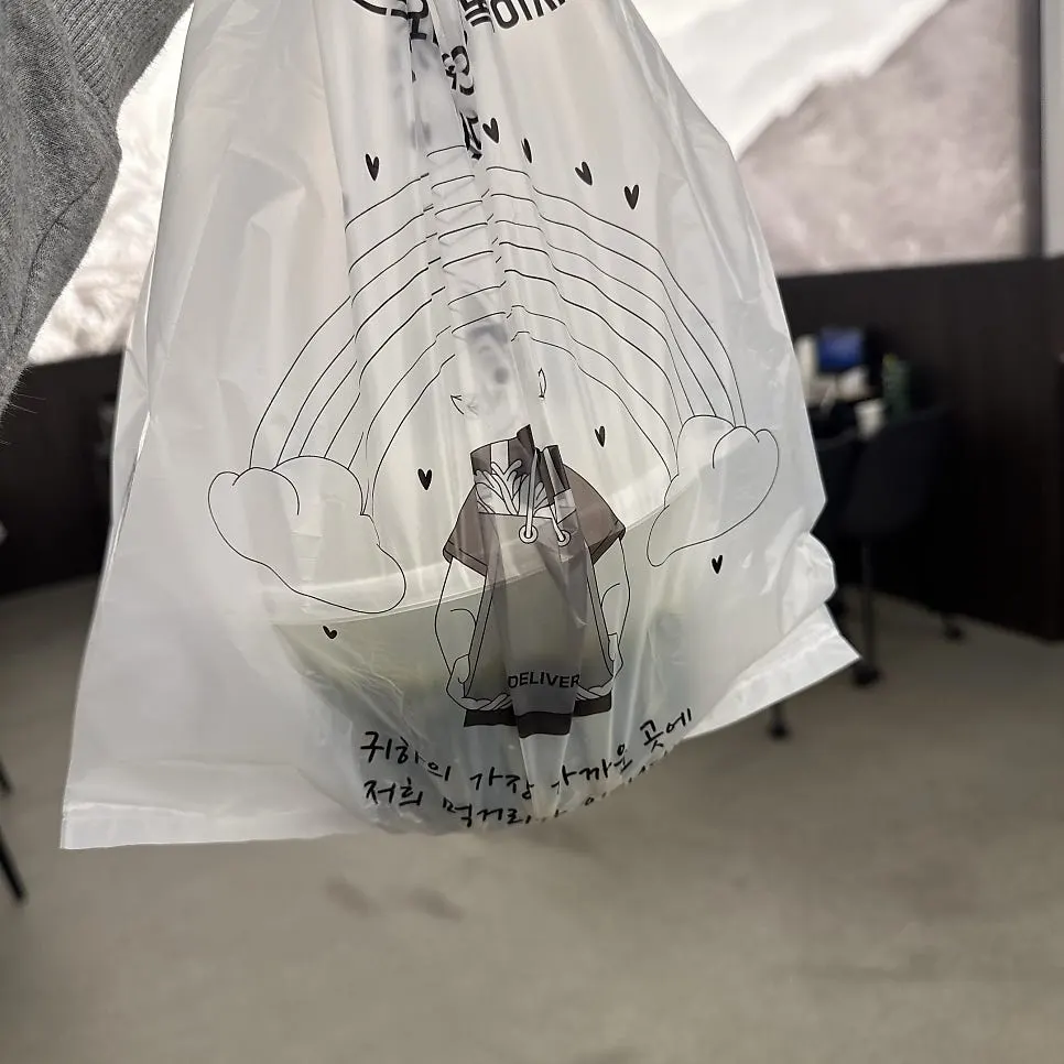 Leftover seaweed soup packed into a takeout container
